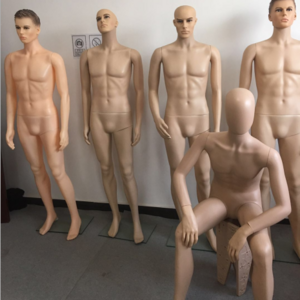 plastic man mannequin in skin color with lifelike head