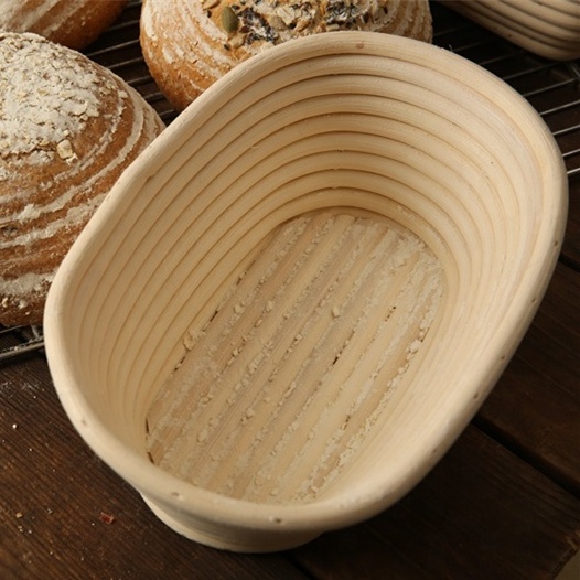 XH Wholesale Factory Handmade OEM Oval Natural Rattan Home Storage Bread Proofing Basket with liner baking tools