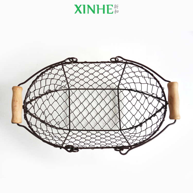 XH wholesale mini size folk art farm home durable black wire iron chicken egg storage basket with wood handle