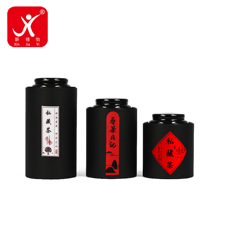 Xin Jia Yi Packaging Paper Cardboard Box Round Black Custom Luxury Black Tea Different Sizes Tube With Free PP Gift Bag Package