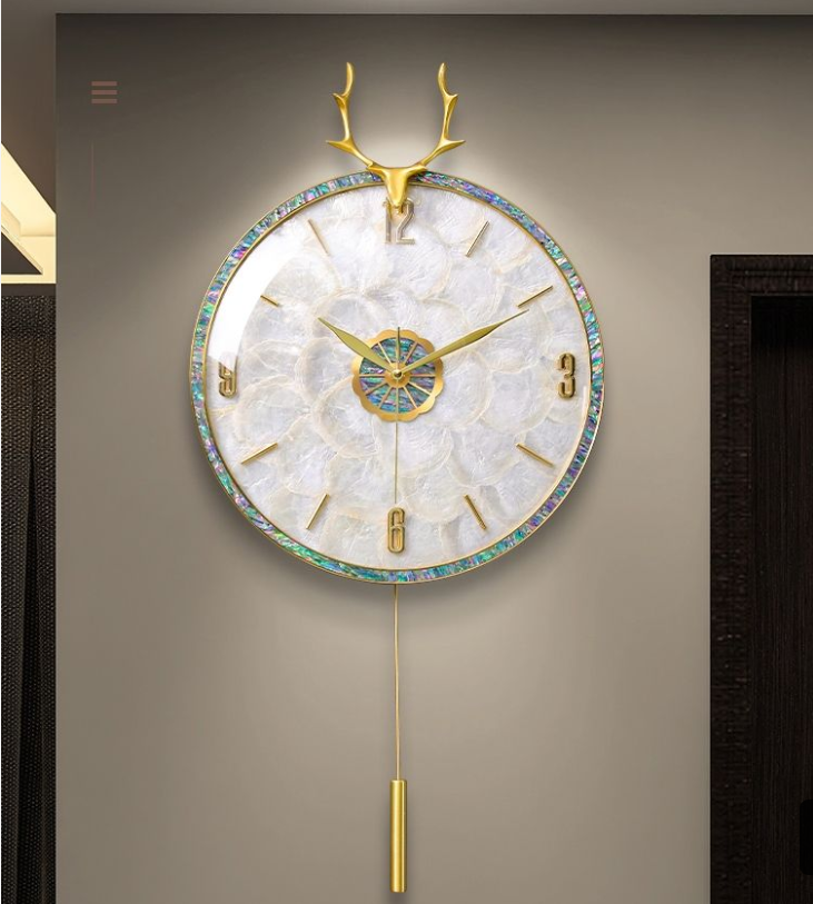 Light luxury shell wall clock hanging wall restaurant modern household simple quartz clock 2023 new living room clock