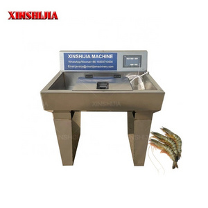 Shrimp prawn halves back open cutting peeling deveining removing cleaning processing machine