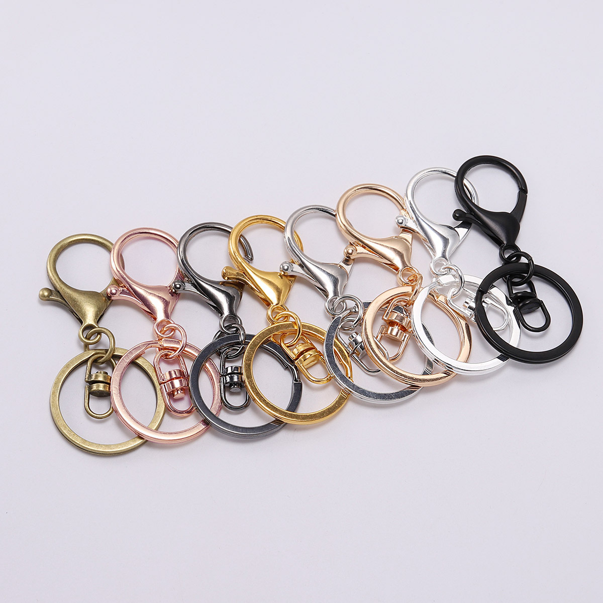 High quality zinc alloy stainless steel keychain three piece set Diy pendant gold-plated silver rotating chain key