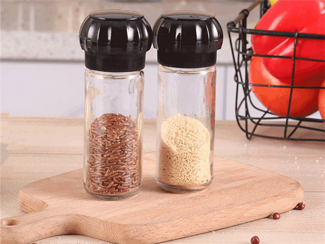 herb & spice mills glass spice jar with grinder for grinding the dry grain, spice