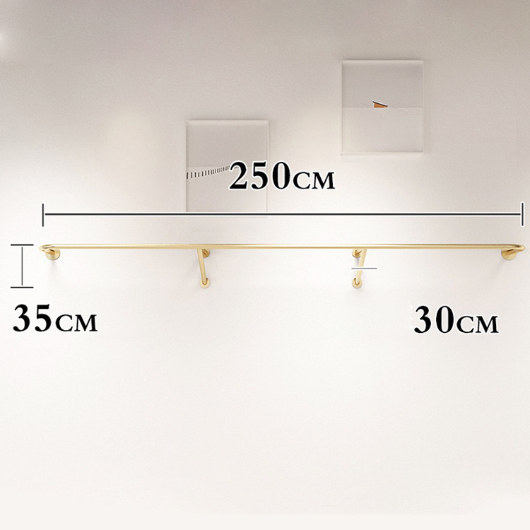 Kainice Custom Garment Stand Clothing Store Interior Design Women Metal Gold Wall Mounted Pipe Clothes Rack For Clothing Store