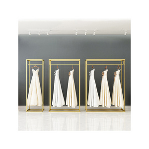 Kainice Retail Store Fixture Hanging Clothes Custom Shop Design Metal Gold Clothing Dress Display Rack