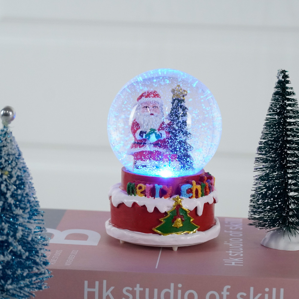 Wholesale led musical resin Christmas scene crystal water snow globe for Christmas Gift and Decoration