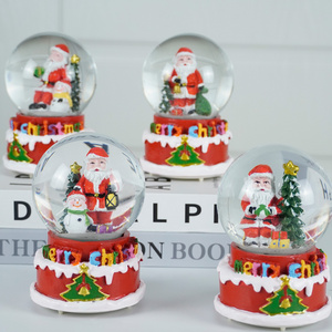 Wholesale led musical resin Christmas scene crystal water snow globe for Christmas Gift and Decoration