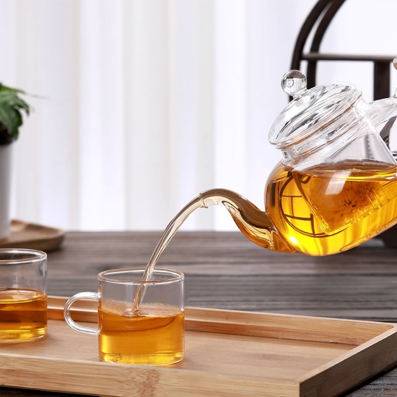 Wholesale heat resistant transparent glass flower tea kettle high borosilicate glass tea pot