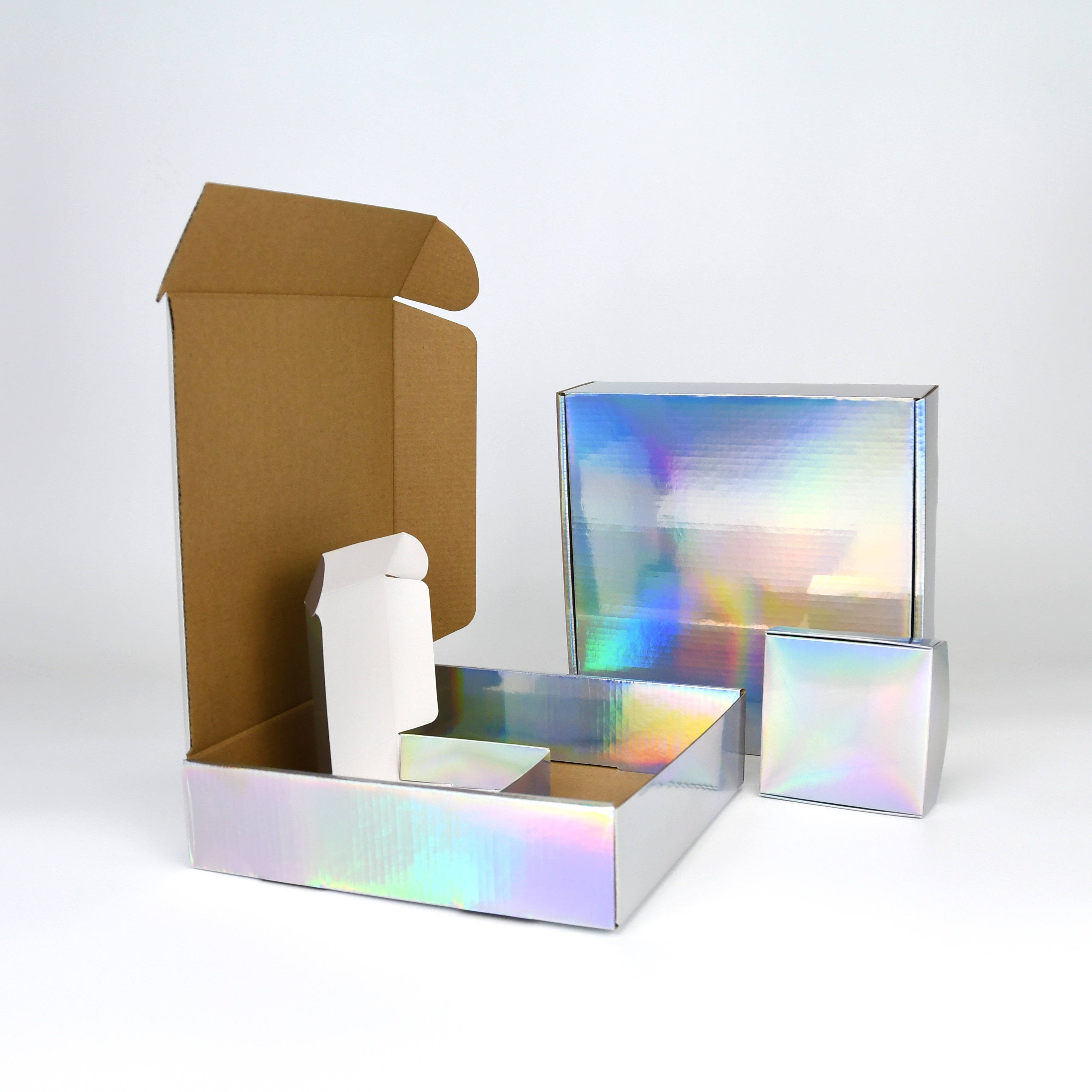 Recyclable Flat Folded Corrugated Cardboard Laser Mailing Paper Box With Holographic Package Box For Cosmetics Glitter Gift Box