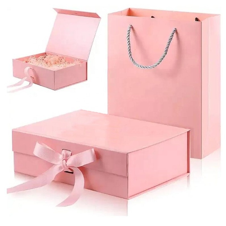 Wholesale luxury rigid pink paper custom logo print magnetic gift packaging box with ribbon bow for clothing