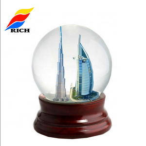 Dubai Cheap Polyresin Custom Snow Globe Kit Glass Souvenir Custom Made Wooden Base