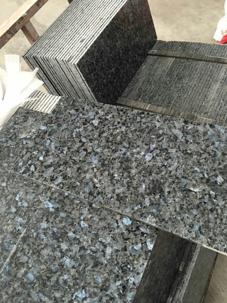 Pearl Blue granite for countertops and wall tiles