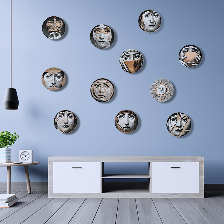 Wholesale decorative  ceramic art Nordic hanging sitting wall decor gold 8 inch round human face plate