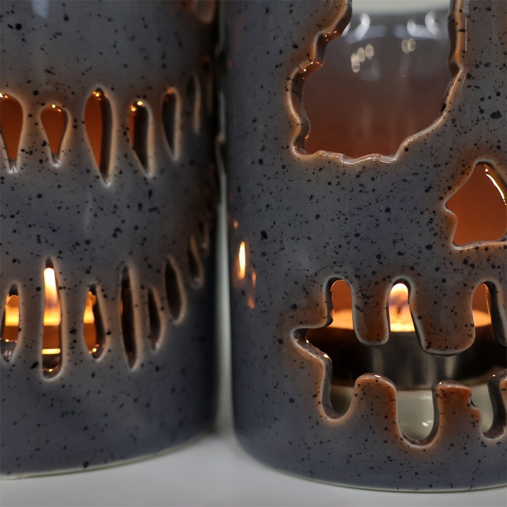 Custom Halloween decor tea light holder ceramic hollowed-out Jack o lantern lol face tea light candle lantern with inner base