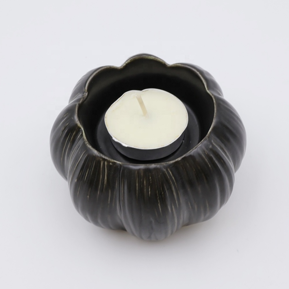 Custom handmade holiday Halloween Thanksgiving home decor small candle holder ceramic mini matte black pumpkin tealight holder