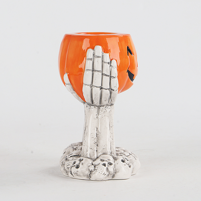 Creative  ceramic skeleton hand with pumpkin candlestick holder hand painted candle holder for Halloween decoration