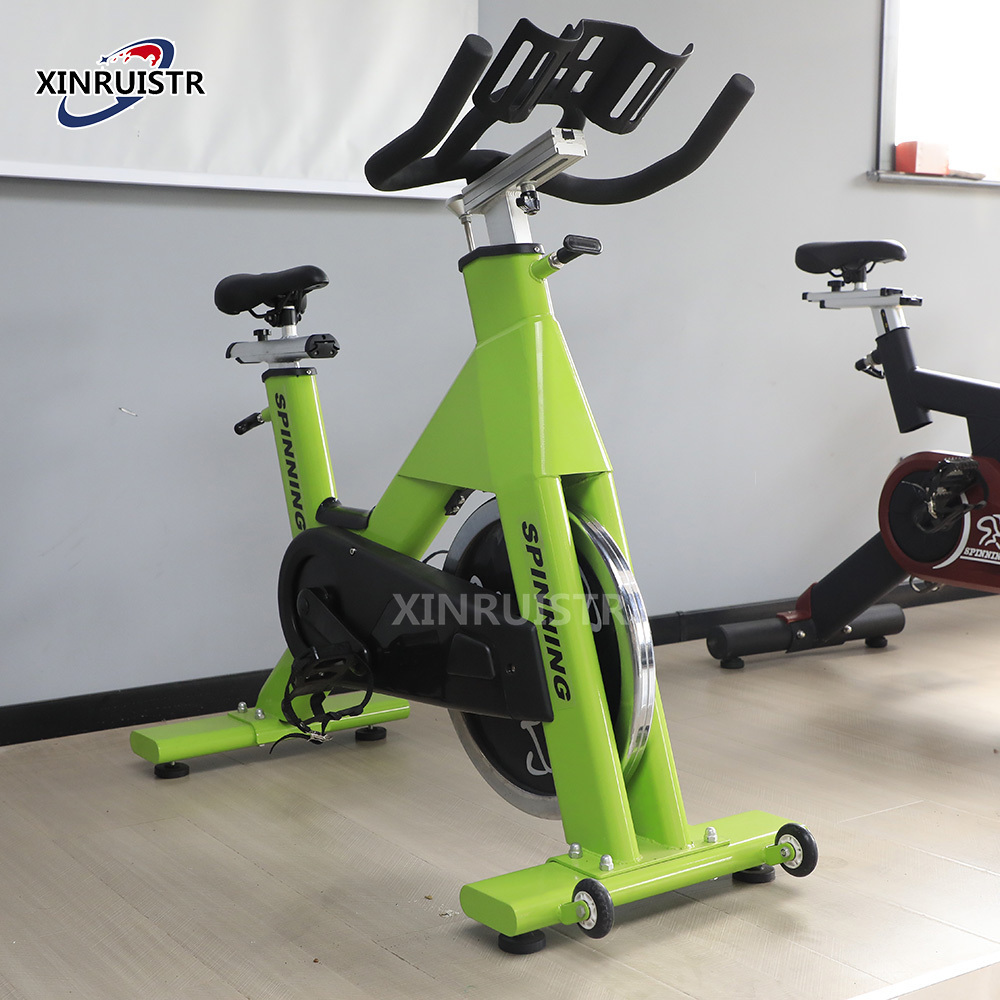 Commercial Gym Equipment Body Strong Bicycle Exercise Magnetic Stationary Spinning Bike With Screen Indoor Fitness Bike