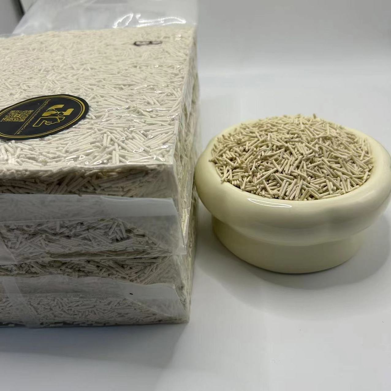 Tofu cat litter made from soybean byproduct is an eco-friendly clay-alternative that absorbs odors in a cat's litter box.