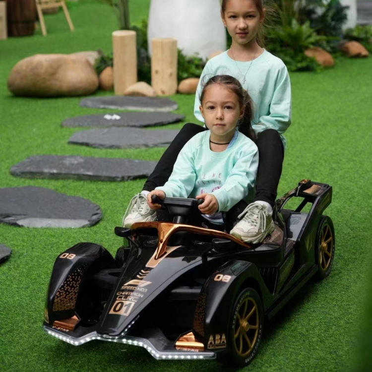 Hot sale go kart ride on car for kids 2 seater kids car electric 12v 4 engine battery