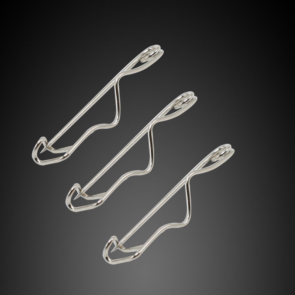 Provide curved shape brooch of safety pins