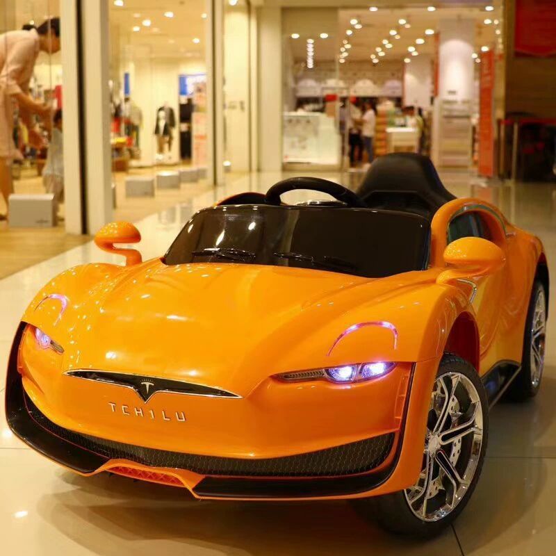 Tesla children's electric vehicle, four-wheel remote control car, can sit four-wheel drive toy electric scooter