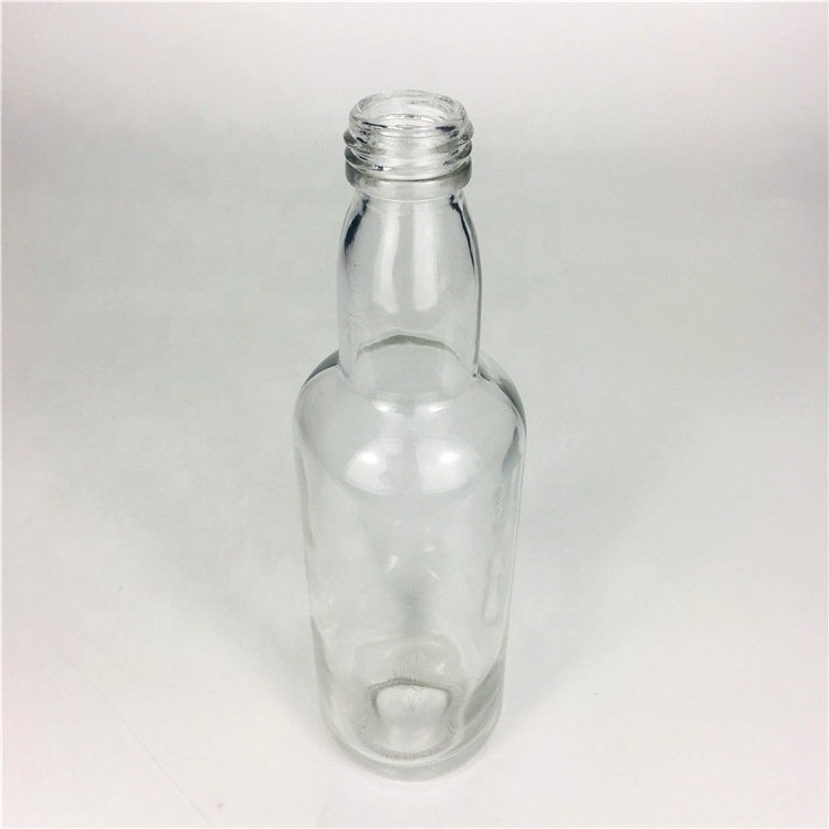 Wholesale 100 ml clear glass sauce bottle for sesame oil with plastic cap