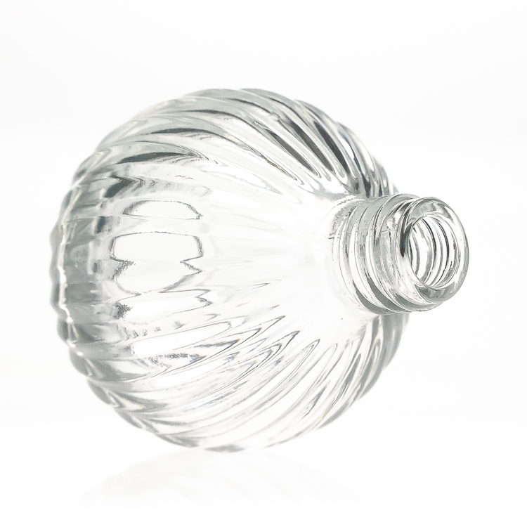 Perfume Bottles 50ml Round Ball Embossed Perfume Glass Bottle with Pump Spray