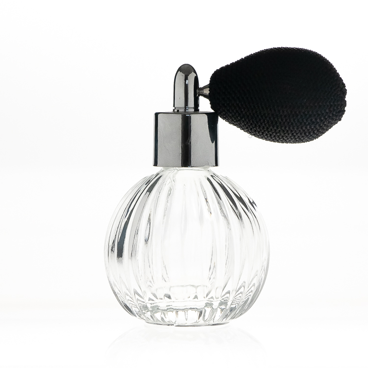 Perfume Bottles 50ml Round Ball Embossed Perfume Glass Bottle with Pump Spray