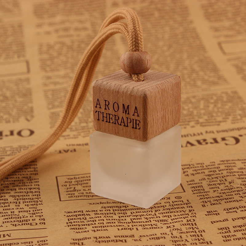 Wholesale 10ml Air Freshener Diffuser Empty Frosted Car Hanging Perfume Bottle With Wooden Cap