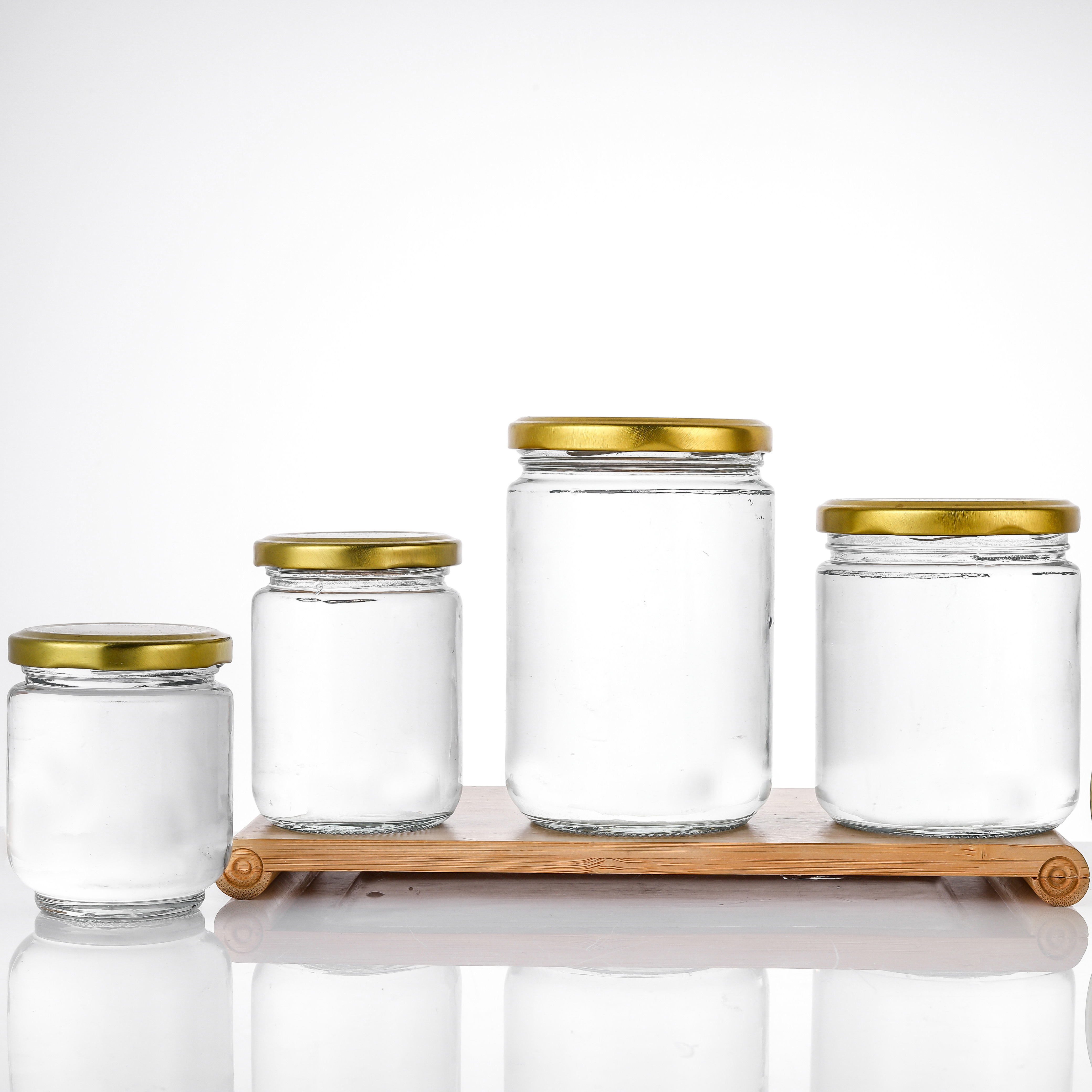 Factory supply 5oz 8oz 12oz 17oz empty clear candy round containers glass jars in bulk with gold metal lids