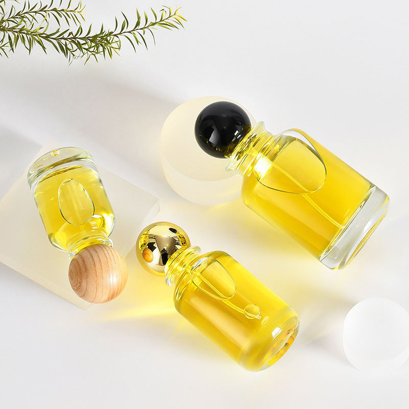 Custom Wholesale 50 ml 30 ml 100 ml Perfume Bottle empty with Wooden Lid Round Clear Perfume Glass Bottles