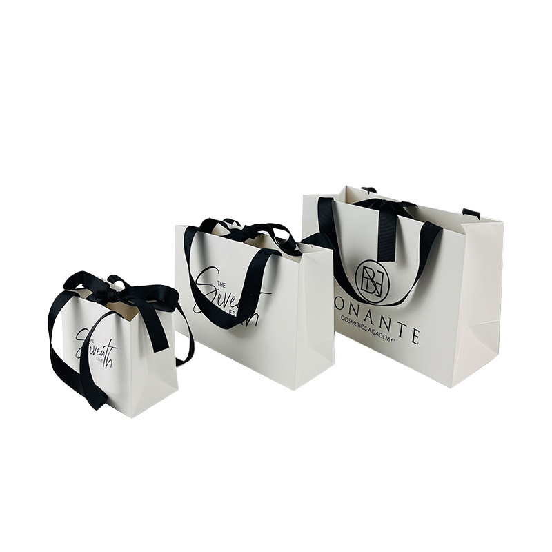 Custom White Paper Bag With Ribbon Uv Printing Logo Clothing Wigs Candle Packaging Bags For Small Business Paper Bag