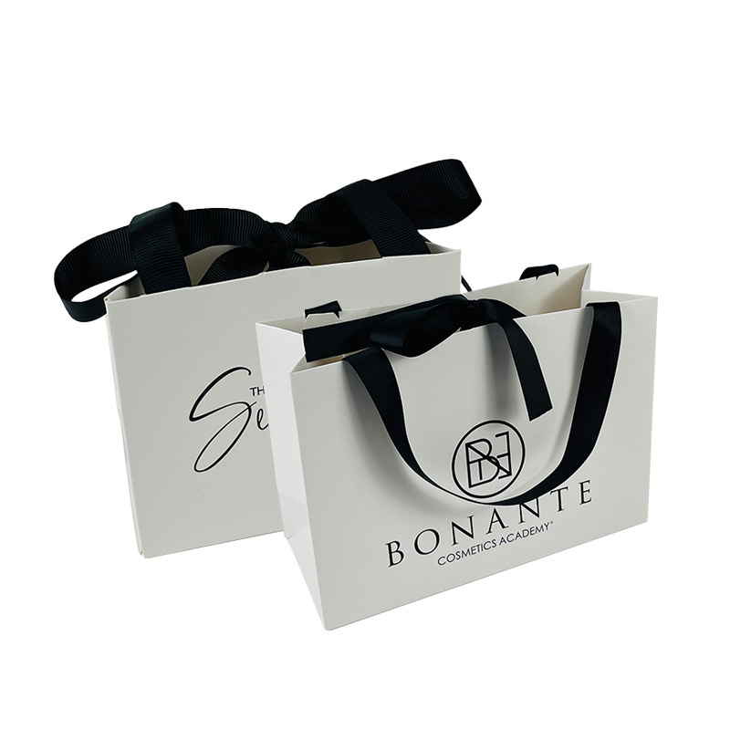 Custom White Paper Bag With Ribbon Uv Printing Logo Clothing Wigs Candle Packaging Bags For Small Business Paper Bag