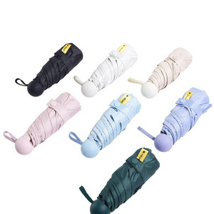 Mini 50% discount capsule sun umbrella ultra light portable rain and sunshine dual use outdoor sunscreen UV protection