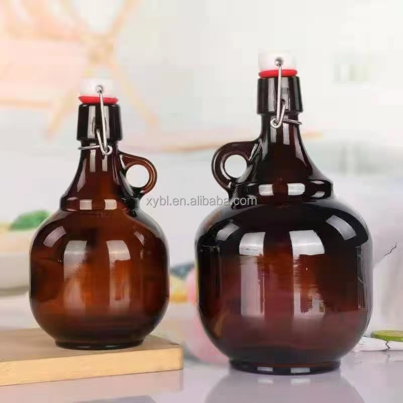 Cheap 500ml 700ML beer glass bottle oil cold pressed beverage juice glass bottle with swing top