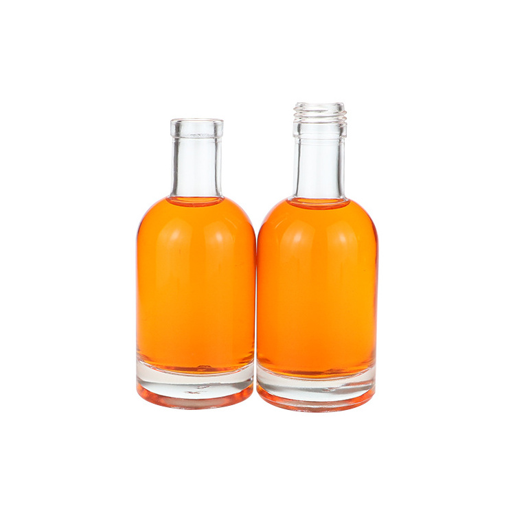 Cheap 500ml 700ML beer glass bottle oil cold pressed beverage juice glass bottle with swing top