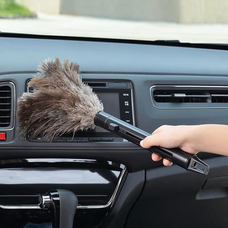 Ostrich feather duster for fast dust removal from cheap cars manufactured by Chinese factories