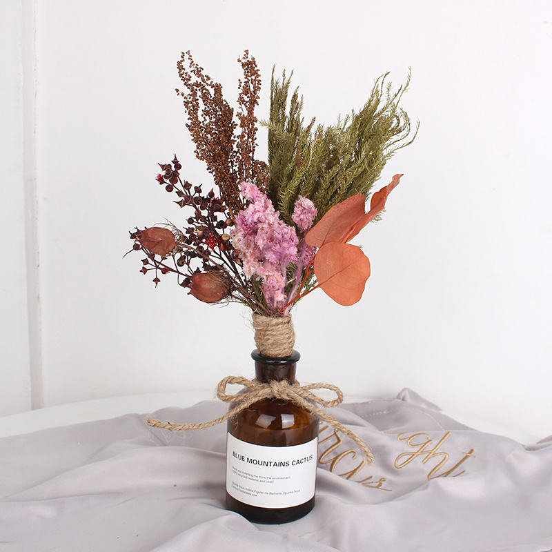 dried flower arrangement with bottle vase for wedding decoration or home decoration