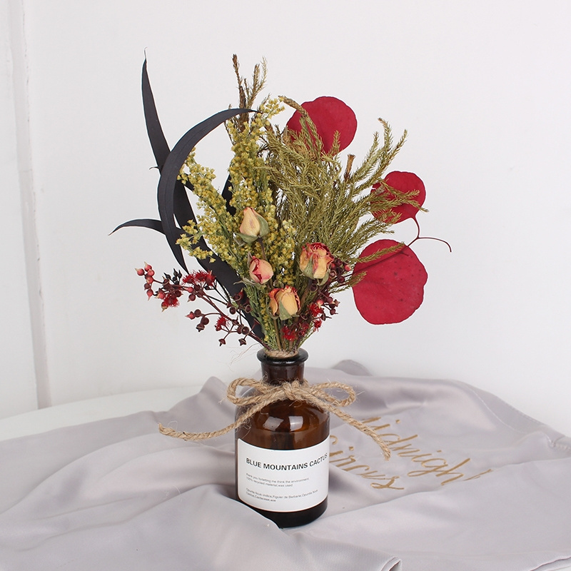 dried flower arrangement with bottle vase for wedding decoration or home decoration