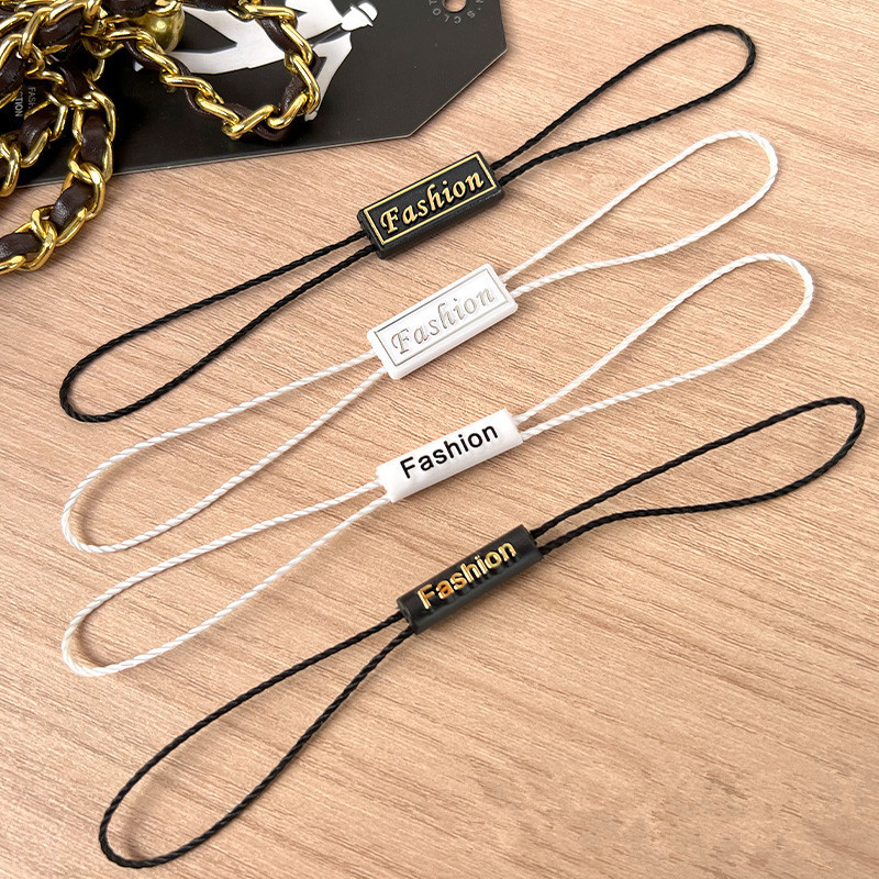 Custom Fashion Free Design Pvc Plastic Paper Garment clothing tag string fabric Hangtag String With Own Logo Clothing Hangtag