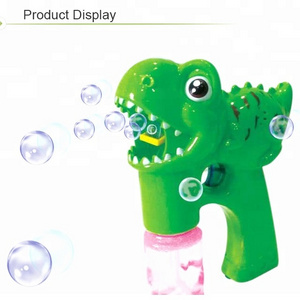 battery operated cartoon 2 bottles soap water dinosaur bubble gun for sale