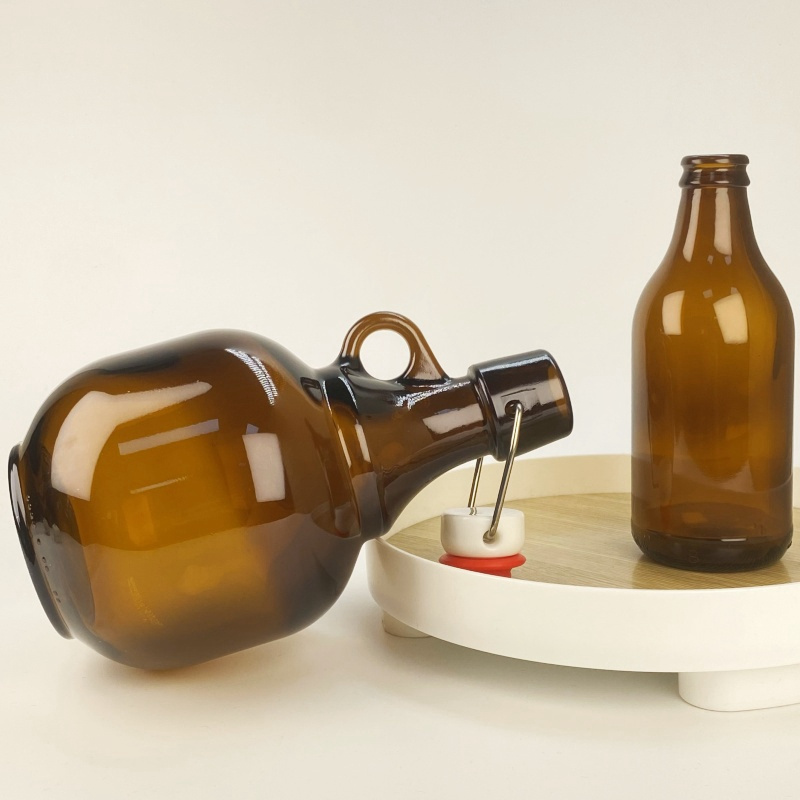 Wholesale 34oz Round Water Kombucha Amber Glass Wine Beer Growler Half Gallon Jugs Bottles With Buckle Rubber Stopper