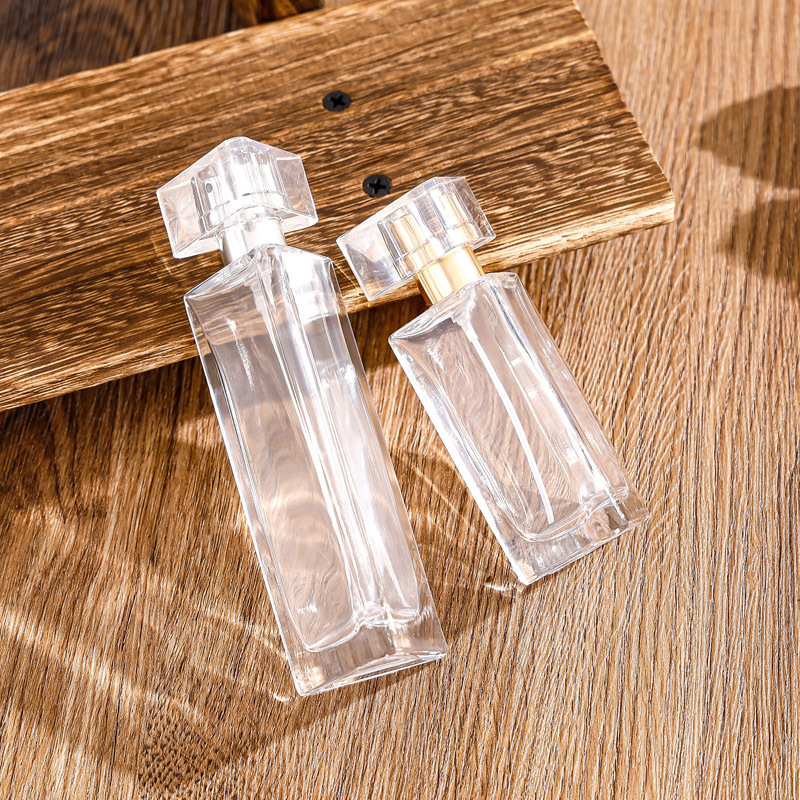 Personalized 30ml 50ml Empty Triangle Glass Bottle Cologne Luxury Perfume Oil Bottle with Atomizer