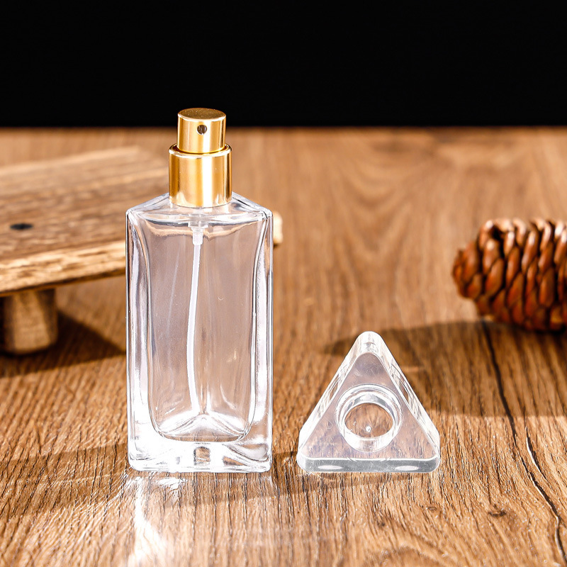 Personalized 30ml 50ml Empty Triangle Glass Bottle Cologne Luxury Perfume Oil Bottle with Atomizer