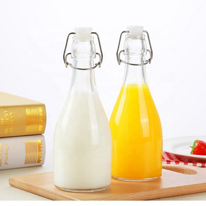 350ml 500ml  glass beverage Juicy bottles  with swing top sealed caps