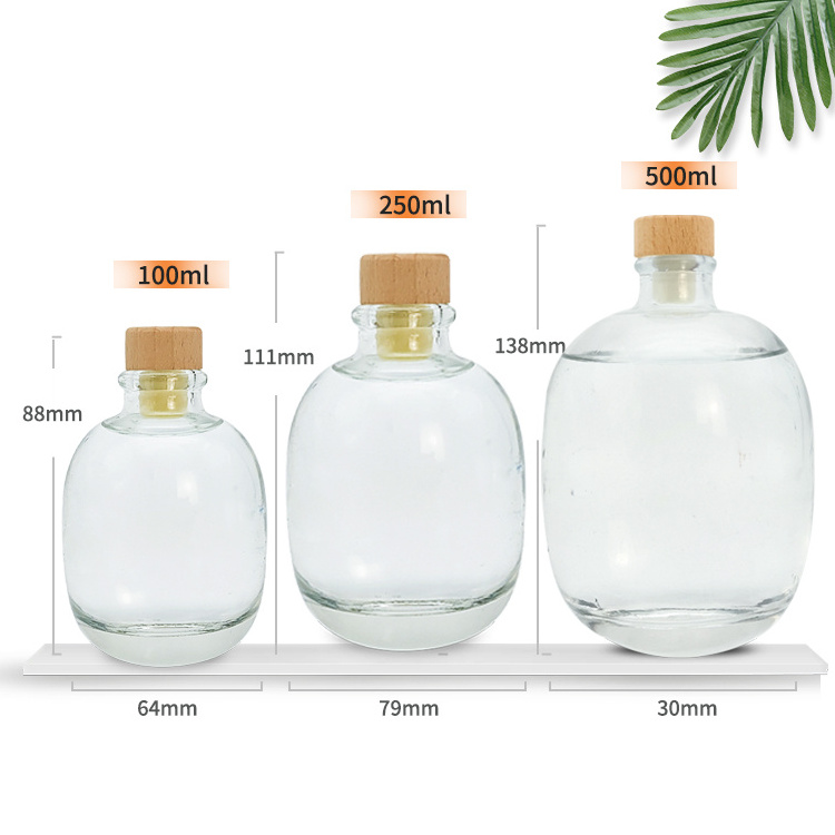 High quality 100ml 250ml 500ml empty clear round glass beverage whiskey vodka wine bottle with bamboo cork cap