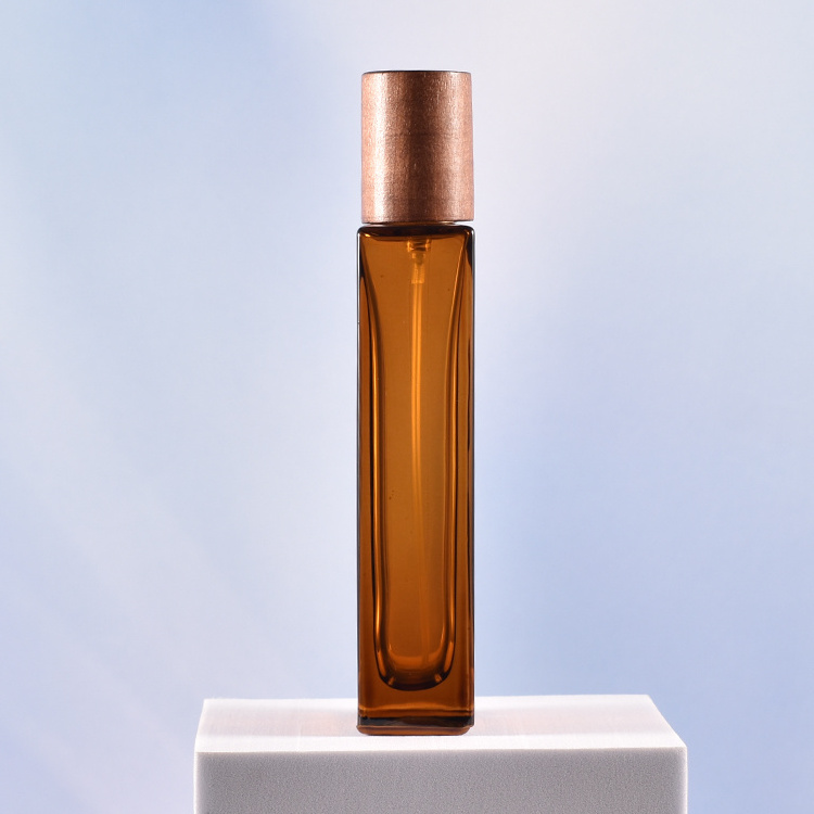 Wholesale spray amber color rectangle perfume bottle 50ml brown mens slim glass perfume bottles with golden pump spray lid