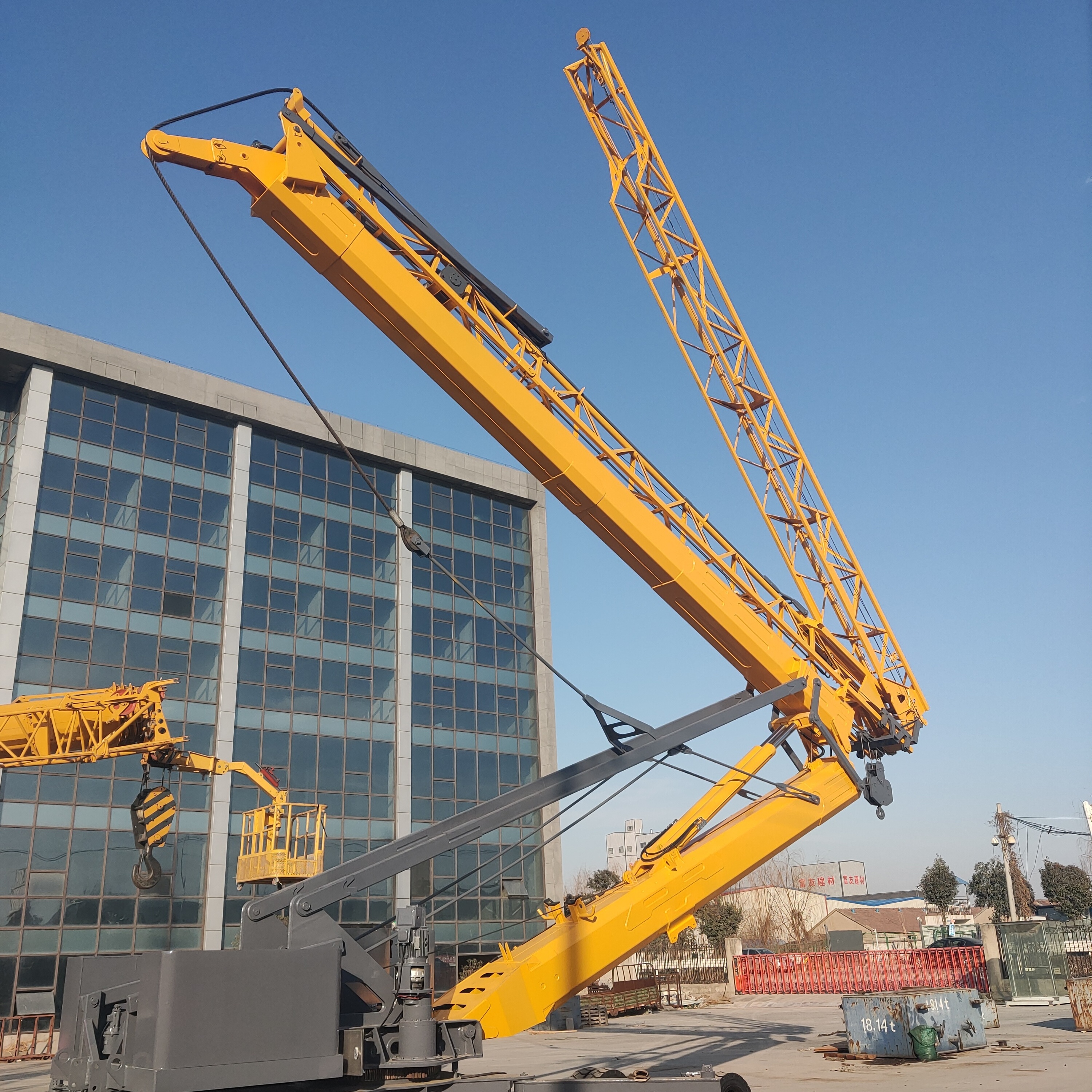 JFYT2527-30 Mini Tower Crane CE Provided Yellow 27m Jib Length 3ton Mini Self Erecting Mobile Foldable Tower Crane Construction