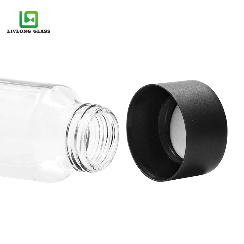 Empty transparent round 12 oz 350ml high flint juice drink beverage mineral water voss glass bottle with screw plastic black lid